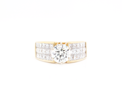Round Diamond with Channel Set Band Engagement Ring