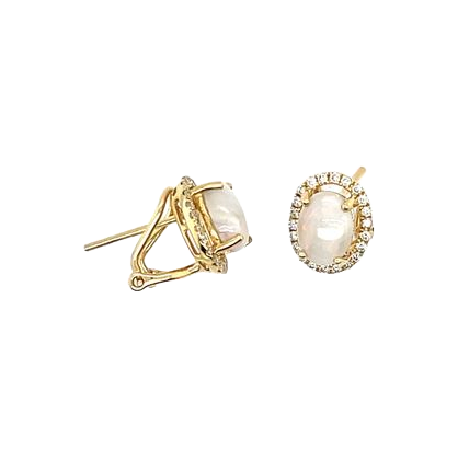 Pair of oval opal and diamond halo earrings in yellow gold, with the left earring angled and the right facing forward.