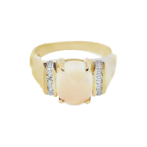 Yellow gold ring with a pale cream opal cabochon, rounded rectangular center, broad shoulders and two rows of diamond accents.