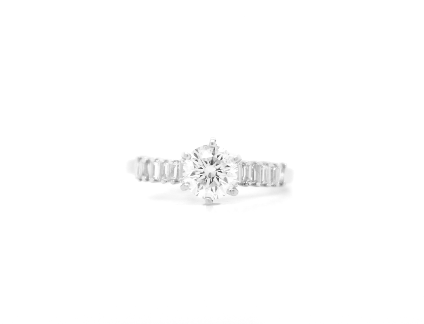 Round Diamond Solitaire and Baguette Engagement Ring