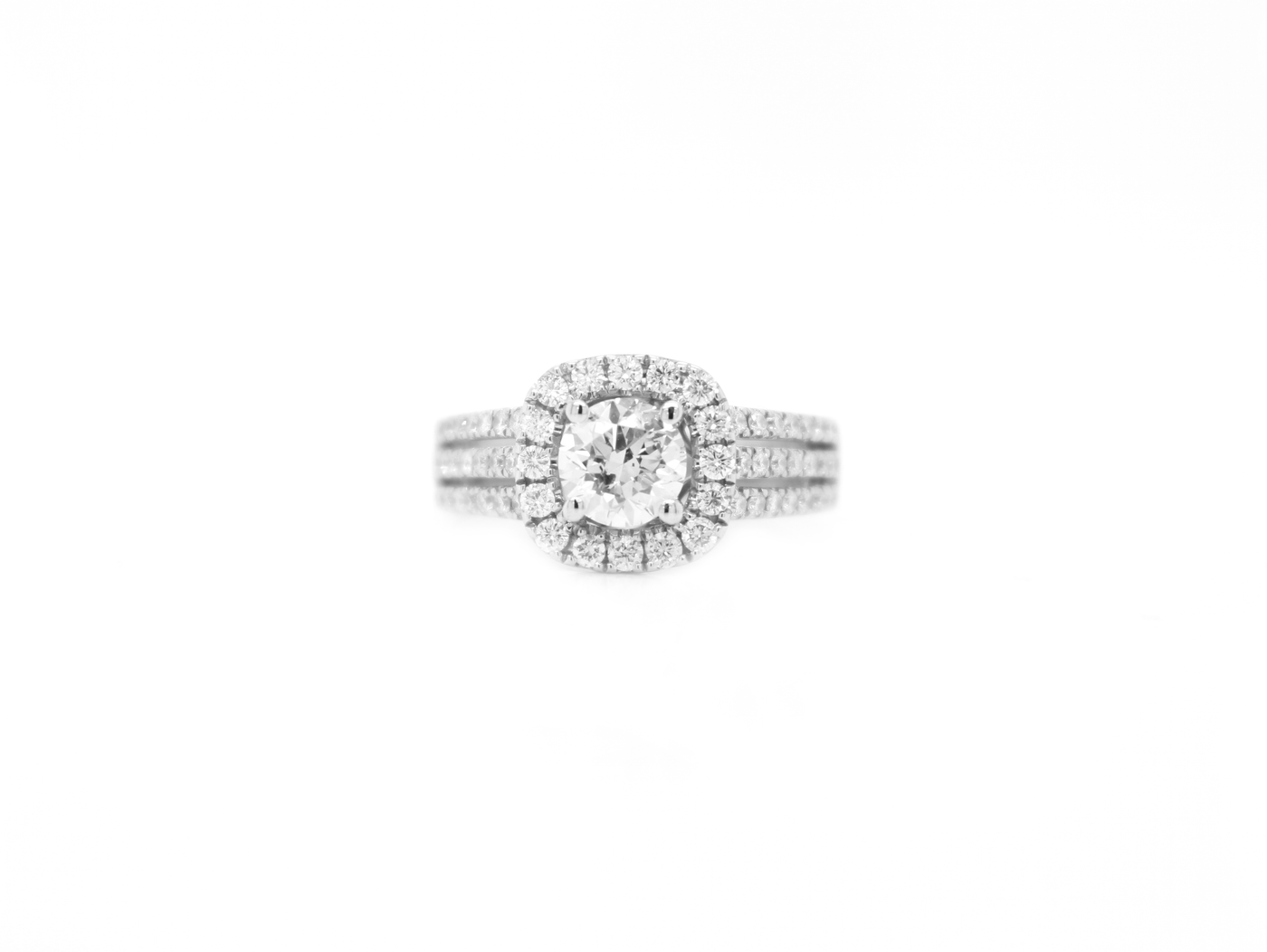 Round Diamond in Cushion Halo Engagement Ring
