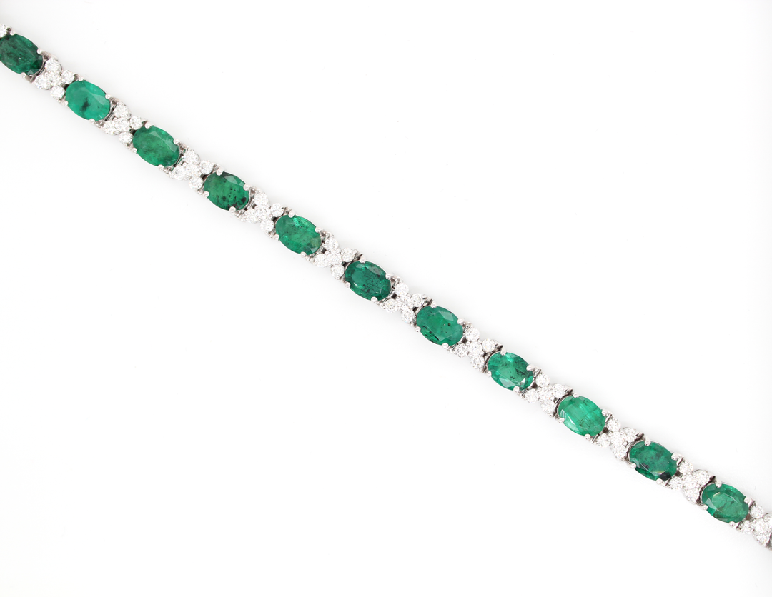 Oval Emerald and Floral Cluster Diamond Tennis Bracelet