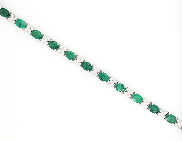 Oval Emerald and Floral Cluster Diamond Tennis Bracelet
