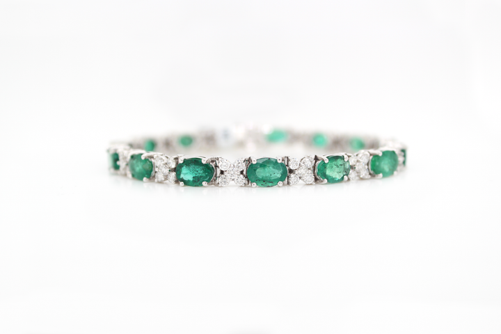 Oval Emerald and Floral Cluster Diamond Tennis Bracelet