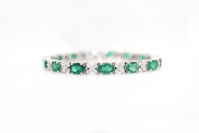 Oval Emerald and Floral Cluster Diamond Tennis Bracelet